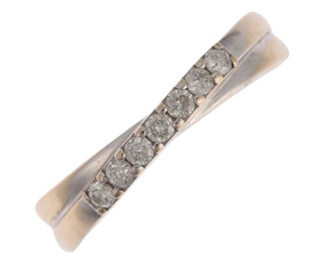 A modern 18ct white gold diamond crossover band ring, pave set with modern round brilliant-cut diamonds, total diamond conten