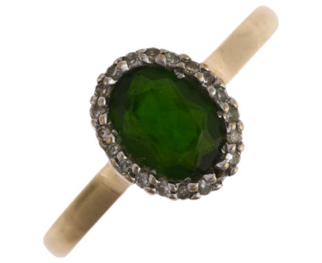 A modern 9ct gold peridot and diamond oval cluster ring, setting height 10.7mm, size T, 2.5g1 diamond missing otherwise no da