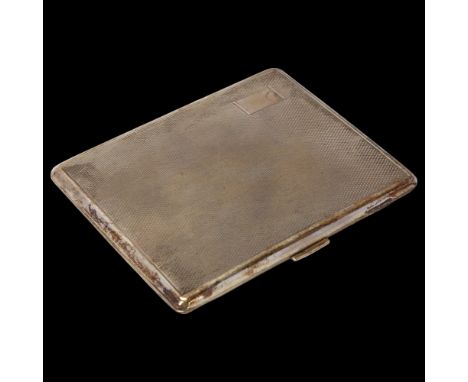 A sterling silver cigarette case, rectangular form, with allover engine turned decoration and gilt interior, 10.5cm x 8.5cm, 