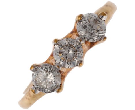 A modern 9ct gold three stone diamond ring, claw set with modern round brilliant-cut diamonds, total diamond content approx 1