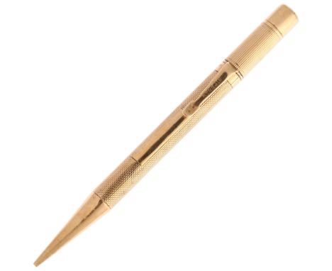 SAMPSON MORDAN & CO - an Art Deco 9ct gold Everpoint propelling pencil, London 1928, engine turned and ribbed barrel, registr