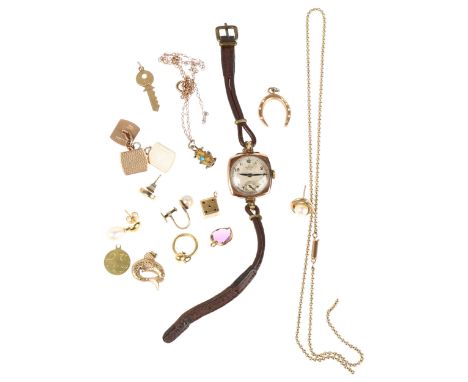 Various jewellery, including 9ct gold (20.7g gross), 15ct horseshoe (1.6g), and 18ct St Christopher (1.1g)Lot sold as seen un