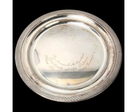 A German circular 800 silver salver, engine turned decoration, military inscription "Major Marcus G McCausland Directorate of