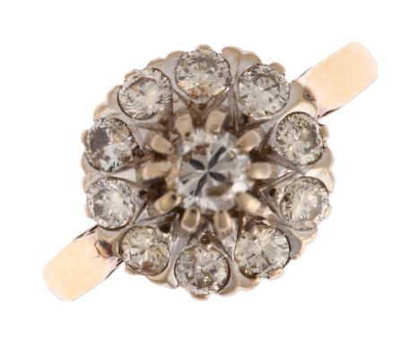 A late 20th century 18ct gold diamond cluster ring, London 1976, set with modern round brilliant-cut diamonds, total diamond 