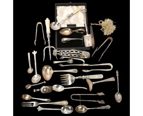 Various silver and plated flatware, including shovel caddy spoon, sugar tongs, mother-of-pearl handled bread fork etcLot sold