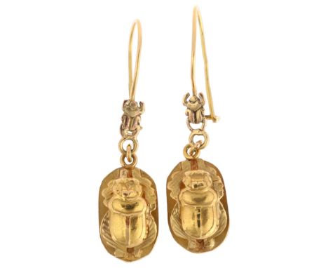 A pair of Egyptian gold scarab beetle drop earrings, with kidney fittings, 40.1mm, 3.9gNo damage or repair, only light surfac
