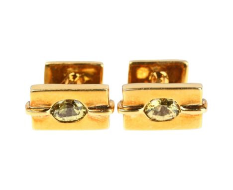 A pair of 18ct gold peridot rectangular cufflinks, 18.5mm, 19.7gNo damage or repair, all stones present, light wear to high p