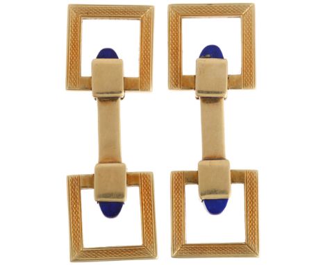 A pair of 14ct gold lapis lazuli snaffle horse bit pattern cufflinks, each with square engine turned articulated rings, set w