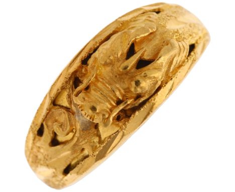 A Chinese 23ct gold dragon band ring, signed with artisan mark, setting height 9.8mm, size T, 7.6gNo damage or repair, only l