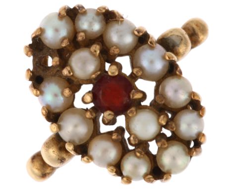 A 9ct gold garnet and pearl oval cluster ring, setting height 17.9mm, size N, 4.7g1 pearl missing otherwise no damage or repa