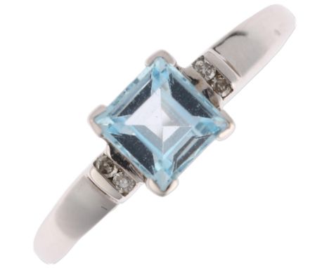 A modern 9ct white gold blue topaz and diamond dress ring, setting height 5.8mm, size M, 1.4gNo damage or repair, all stones 