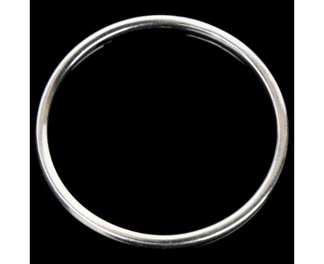 SOREN JORGENSEN - a Danish modernist sterling silver plain form slave bangle, band width 4mm, internal circumference 24cm, 36