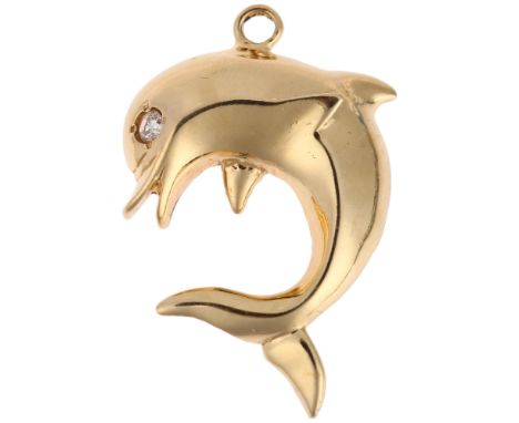 A 14ct gold diamond figural dolphin pendant, 33.7mm, 5.6gNo damage or repair, only light surface wear, stamped 14k 