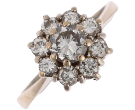 A diamond flowerhead cluster ring, claw set with modern round brilliant-cut diamonds, total diamond content approx 1.1ct, app