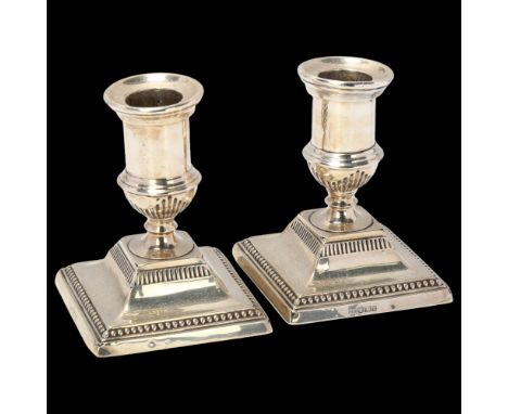 A pair of Edwardian silver squat table candlesticks, Harrison Brothers & Howson, Sheffield 1901, 9cm, weighted bases, 9.5oz g