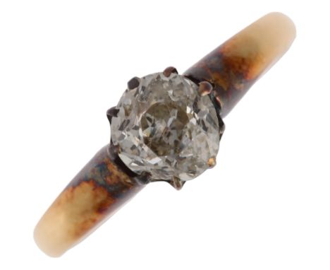 A 1ct solitaire diamond ring, unmarked gold settings, claw set with old mine-cut diamond, diamond weight calculated from dime