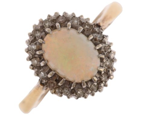 An 18ct gold opal and diamond oval cluster ring, claw set with 0.75ct oval cabochon opal surrounded by single-cut diamonds, s