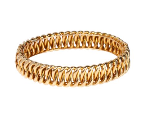 An Antique 15ct gold curb link hinged bangle, band width 12mm, internal circumference 16cm, 27.4gBangle slightly off-round, h