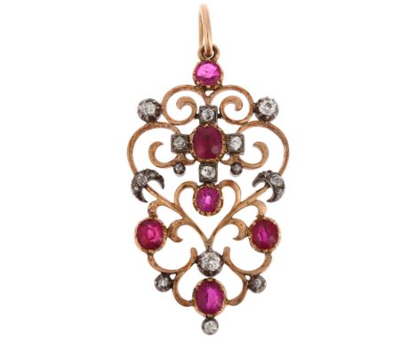 A Victorian gold and silver ruby and diamond openwork pendant, circa 1880, later retailed by Edward Tessier, collet set with 