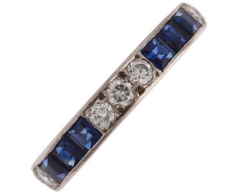 An 18ct white gold sapphire and diamond full eternity ring, London 1975, set with calibre-cut sapphires and modern round bril