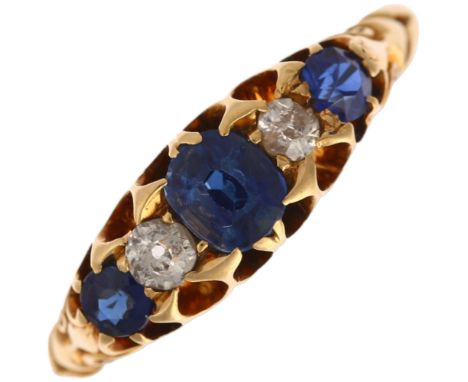 An early 20th century 18ct gold graduated five stone sapphire and diamond half hoop ring, maker L&L, Birmingham 1900, setting