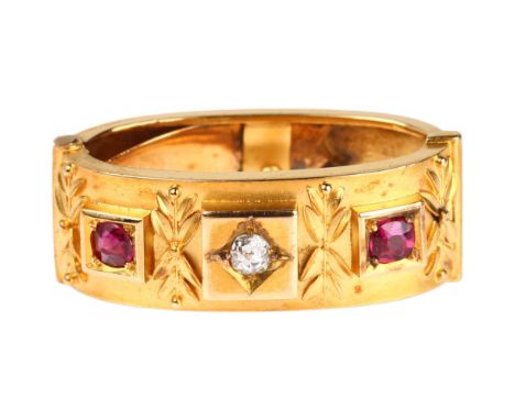 A Victorian ruby and diamond scarf clip, relief applied leaf motifs, apparently unmarked gold settings, length 27.8mm, 5.5gAl