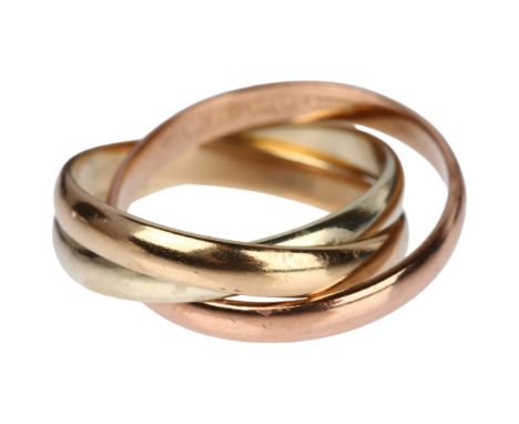 A 9ct three-colour gold triple band ring, maker WGP Ltd, London 1988, size J, 4.4gNo damage or repair, only light surface wea