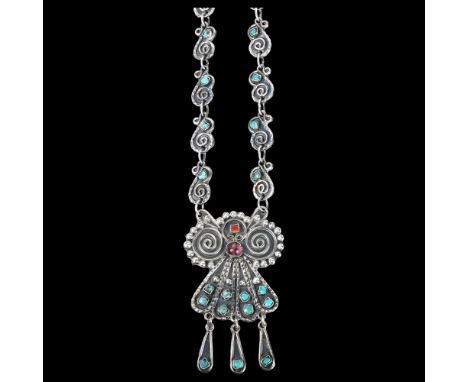 A large Mexican sterling silver gem set owl pendant necklace, set with turquoise matrix and cabochon amethyst, on integral st
