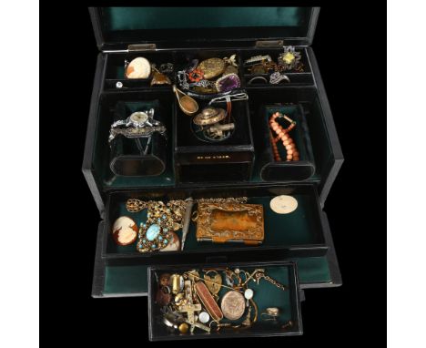 A good quality Victorian green leather dressing table travelling jewellery box and contents, including Georgian coral brooch,