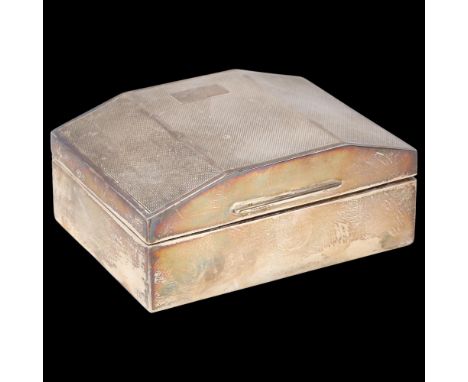 An Art Deco George V silver cigarette box, The User Manufacturing Co, Birmingham 1933, rectangular form, with canted engine t
