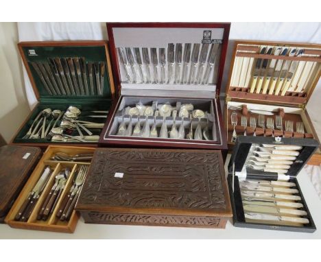 Collection of flatware and 2 boxes , to include a silver plated canteen , and other stainless steel and chrome sets .