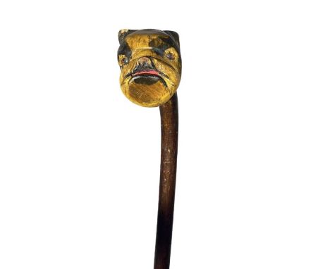 An C1920s&nbsp; hand carved walking stick, the handle in the form of a British Bulldog's head. (1)