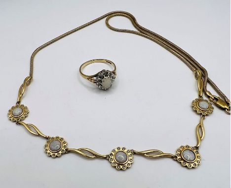 A set of Opal and diamond jewellery, comprising an opal and diamond necklet in 9ct gold (hallmarked London) plus an Opal and 