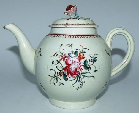 English pearlware globular teapot with a flower finial , decorated with hand painted flowers , circa 180016.5cm high .Small c