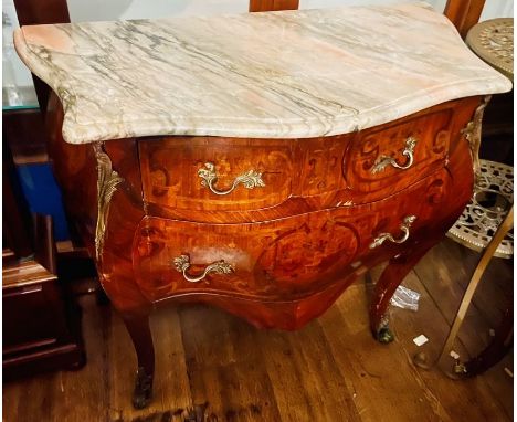A Louis XV revival Kingwood type commode, serpentine marble top on a bombe shaped commode with gilt mounted handles on two sh