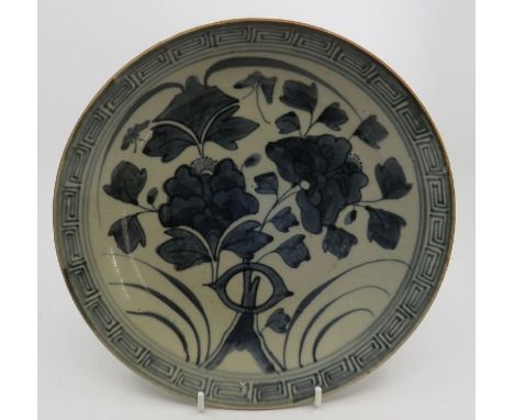 Chinese provincial dish decorated with blue flowers , square seal mark to the base , 19th C 25cm diameterfine 3cm crack on ed