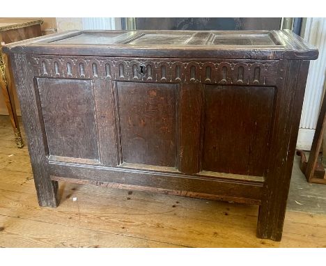 A Charles II revival oak coffer/blanket chest, three panel hinged above arch carved frieze over three moulded panel front, ra
