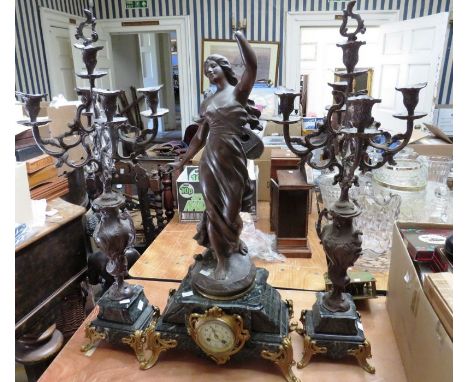 A late 19th century marble, spelter and gilt clock candelabra after A J Scotte, depicting Diana mounted on a mantle clock, se
