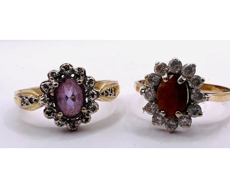 A pair of 9ct gold dress rings: An amethyst and diamond cluster ring, hallmarked 9ct gold. Size O; plus a 9ct gold garnet and