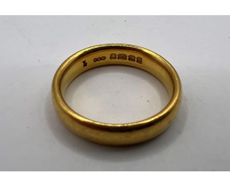 A 22 ct gold band ring. gross weight approx 6.5 grams.