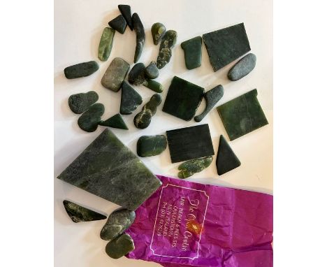 A substantial quantity of spinach Nephrite Jade rough, believed to be from New Zealand. Approximate weight 512 grams to inclu