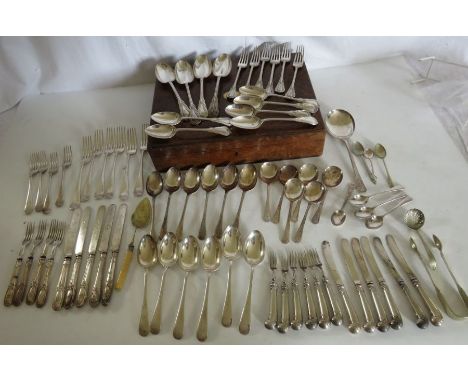 Large quantity of silver plated flatware with an empty oak cutlery box , to include a set of 6 knives and forks with silver h