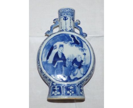 A Chinese porcelain moon flask with blue and white decoration, 19th century but with earlier four character mark, 20.5cm h