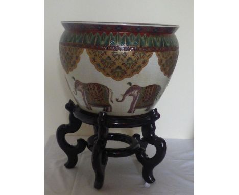 large ceramic elephant decorated jardinière with coy carp decorated inside along with a wooden footed stand (2) total height 