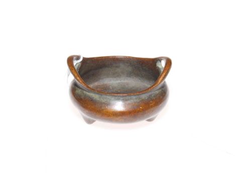 Bronze two handled censor with six character mark to base, 8cm.