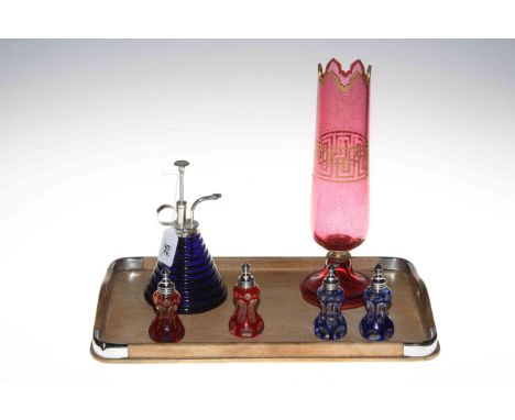 Bohemian gilded ruby glass vase, four overlay glass perfume bottles and blue glass perfume spray.