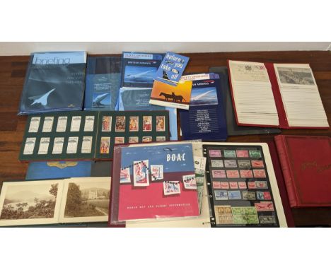 A collection of concord, British Airways and BOAC related ephemera along with a stamp album, vintage postcards and a collecti