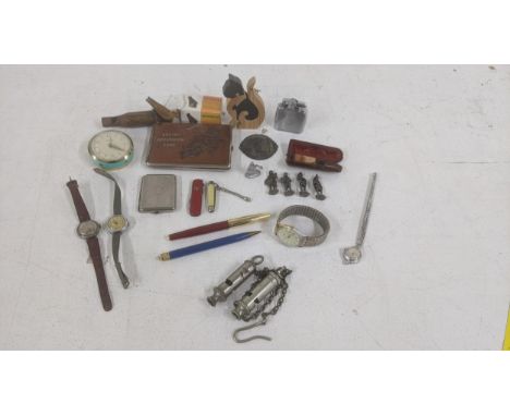 A mixed lot to include two police whistle, one being a Metropolitan example, a gents Timex wrist watch on an expanding bracel