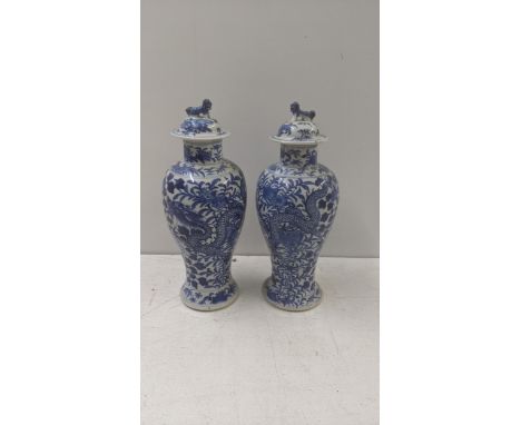 A pair of late 19th century Chinese Kangxi style blue and white vases A/FLocation:If there is no condition report shown, plea