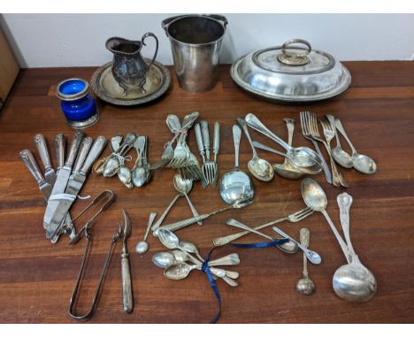 Silver plate to include an ice bucket, an entrée dish, flatware and other itemsLocation: GIf there is no condition report sho